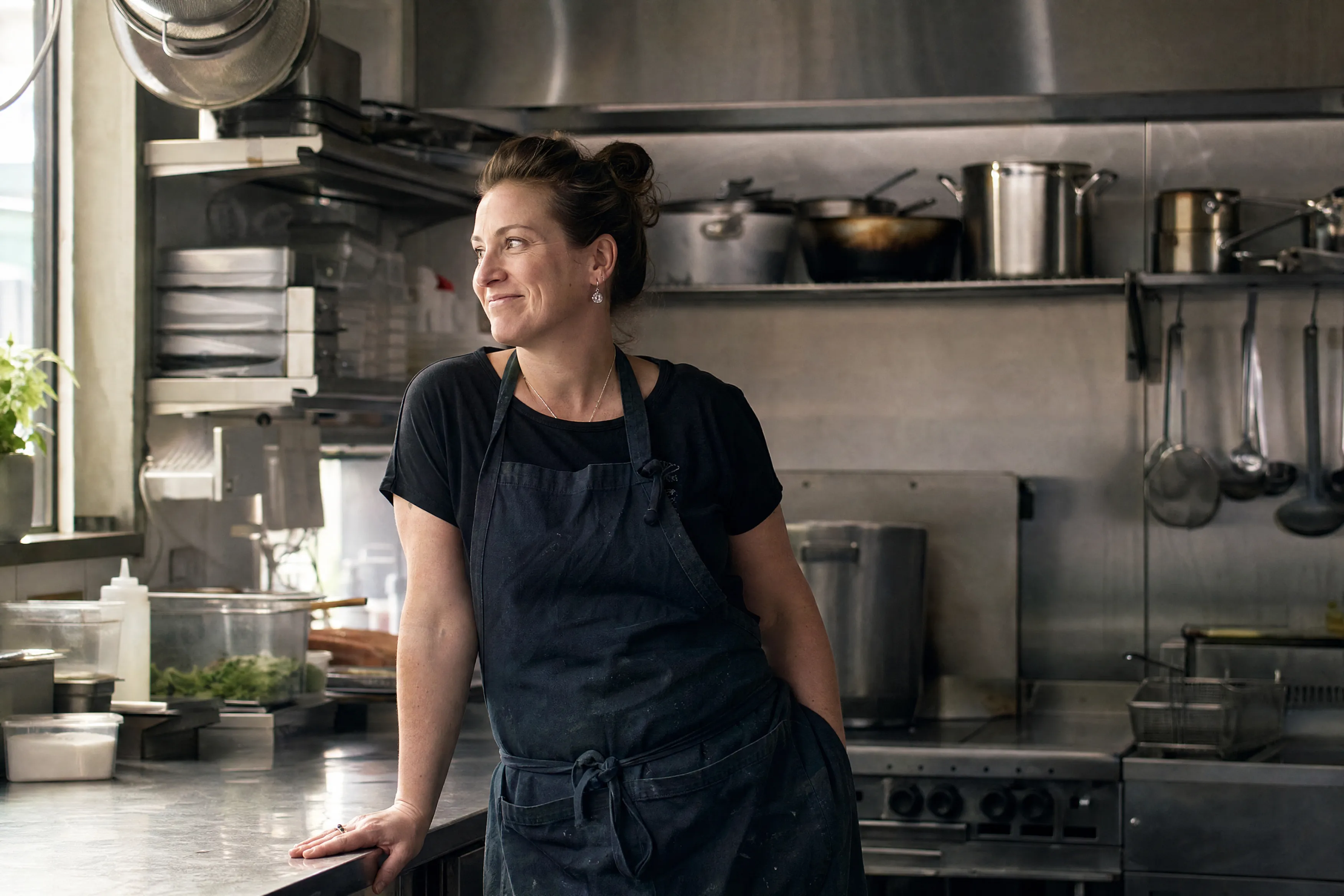 Cafe owner in her newly refitted kitchen