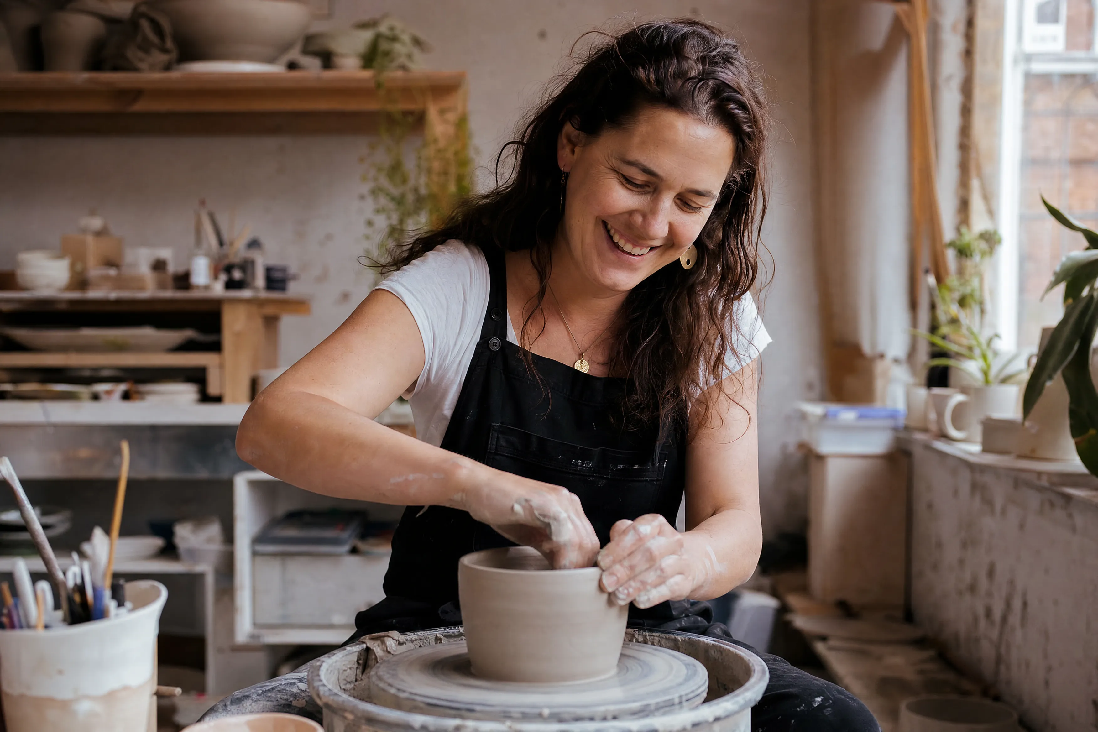 Owner at work in her ceramics studio