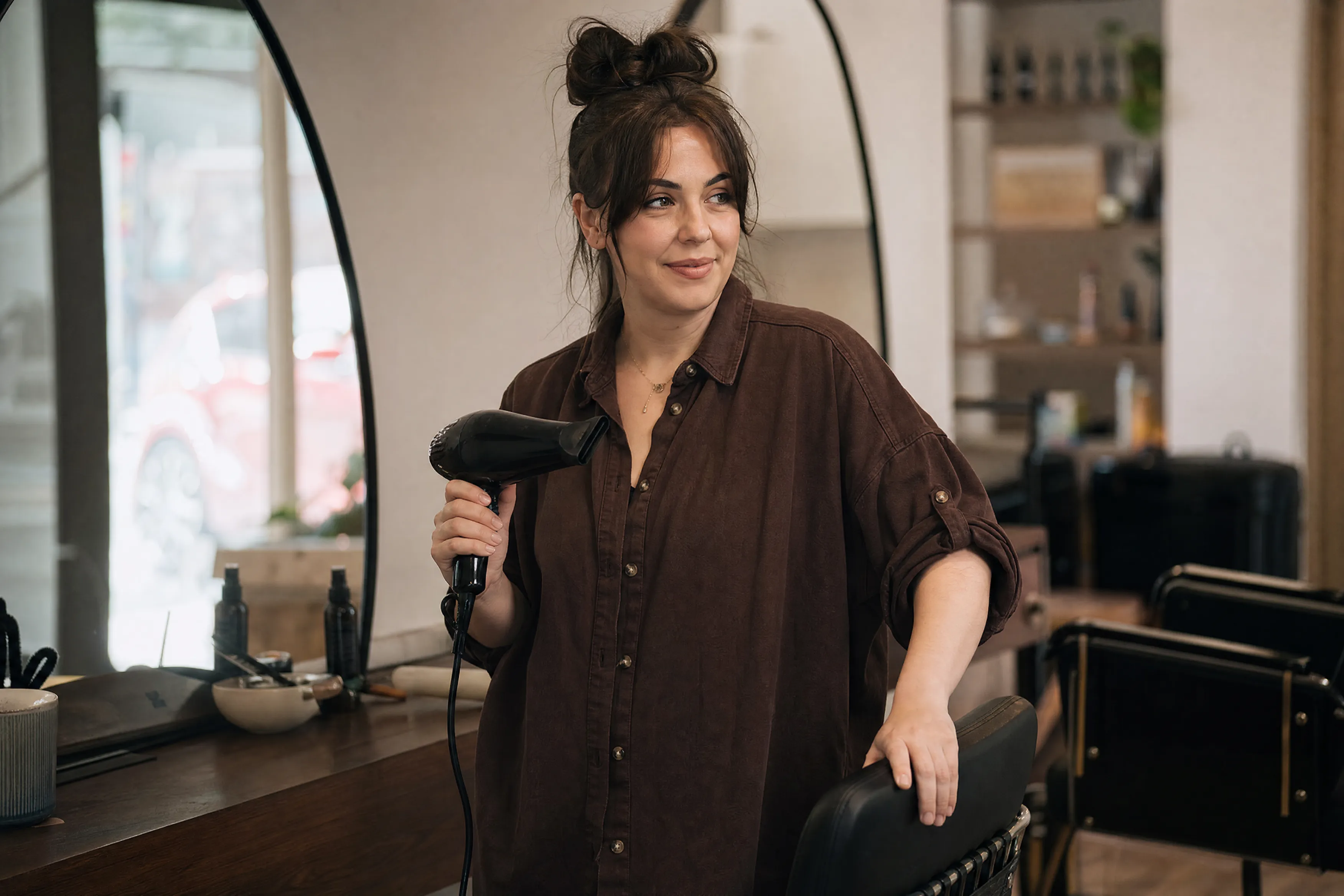 Canberra salon owner at her styling station